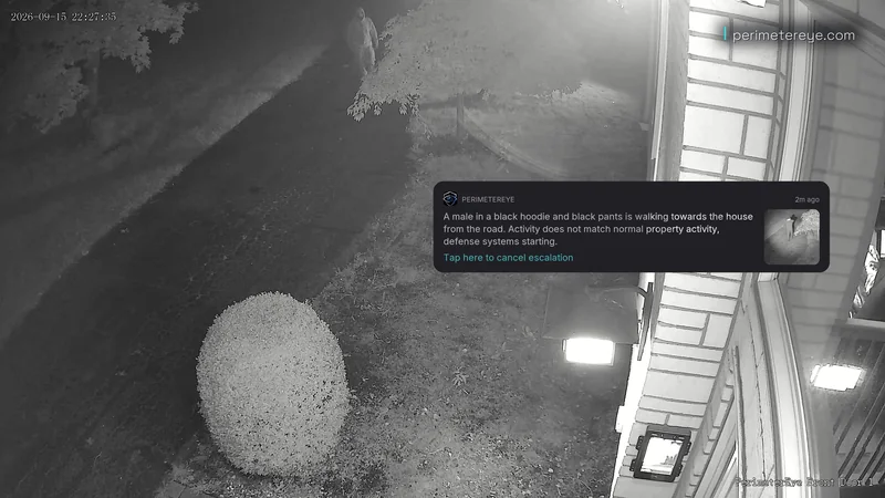 Infrared view of the person on the driveway with the PerimeterEye alert on screen